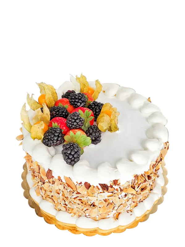Berry cake topped with fresh strawberries and blueberries